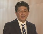 Photograph of the Prime Minister holding the press conference